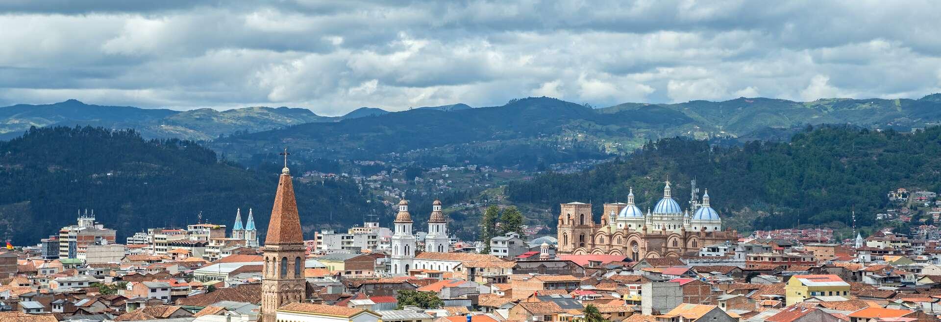 View of the city of Cuenca, Ecuador, with it's many churches, on a cloudy day