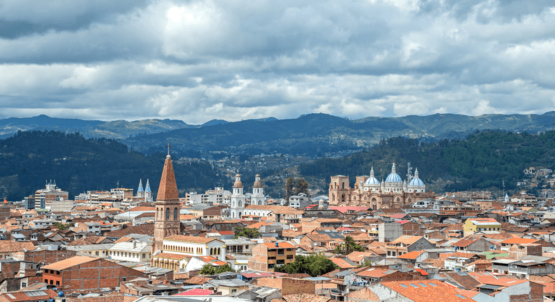 View of the city of Cuenca, Ecuador, with it's many churches, on a cloudy day