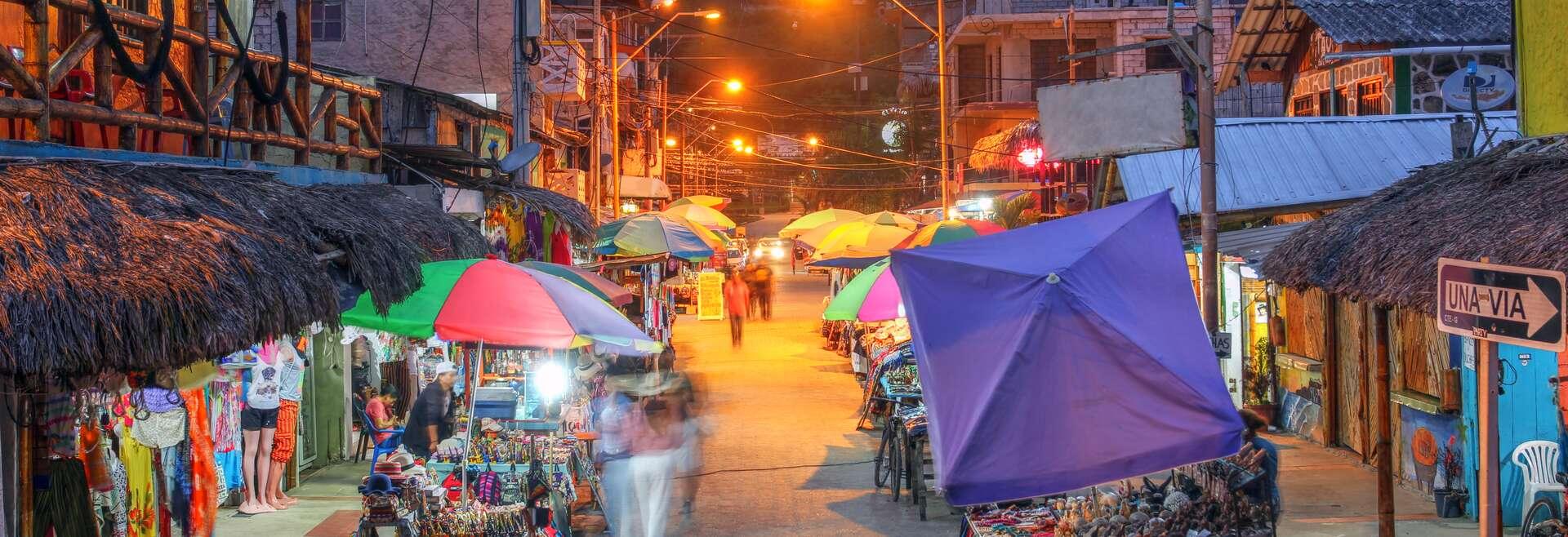 Night scene with street market in the small resort town of Montanita, Ecuador