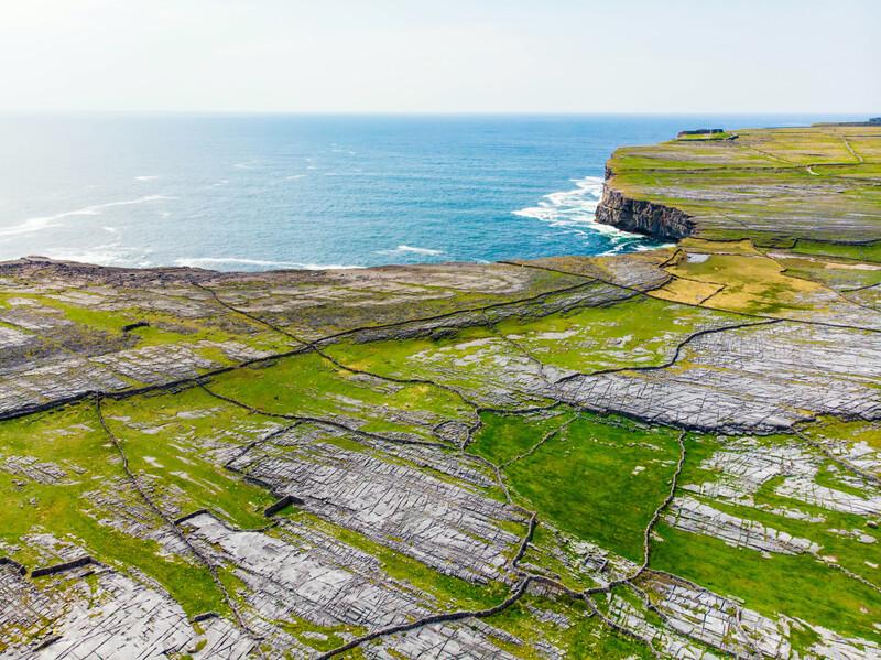 Aerial view of Inishmore or Inis Mor, the largest of the Aran Islands in Galway Bay, Ireland. Famous for its strong Irish culture, loyalty to the Iris