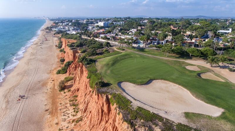 Aerial. View from the sky at the golf courses in the tourist town Vale de Lobo. Vilamoura